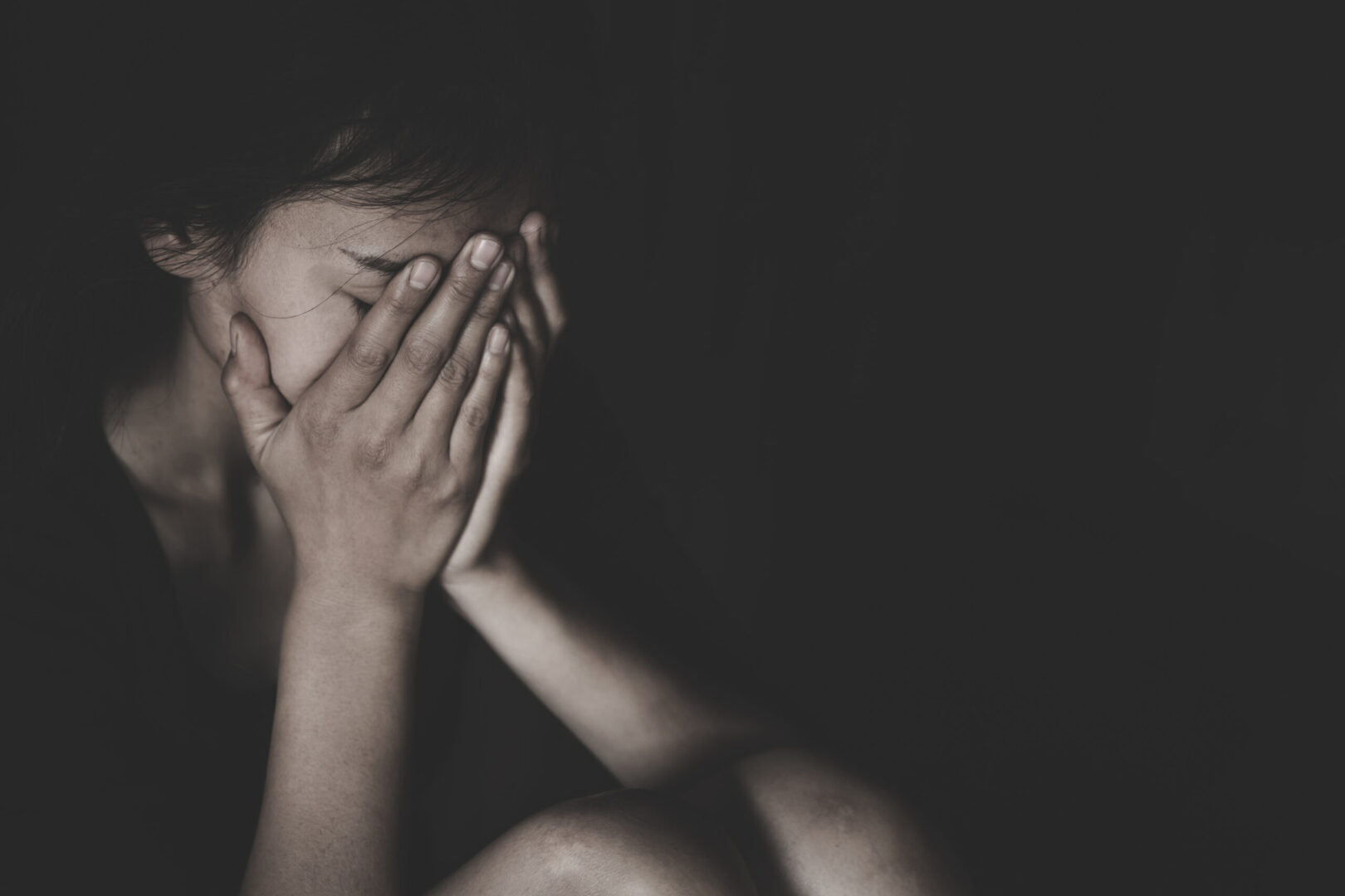 A,Women,Crying,With,Her,Hands,On,Her,Face,Isolated
