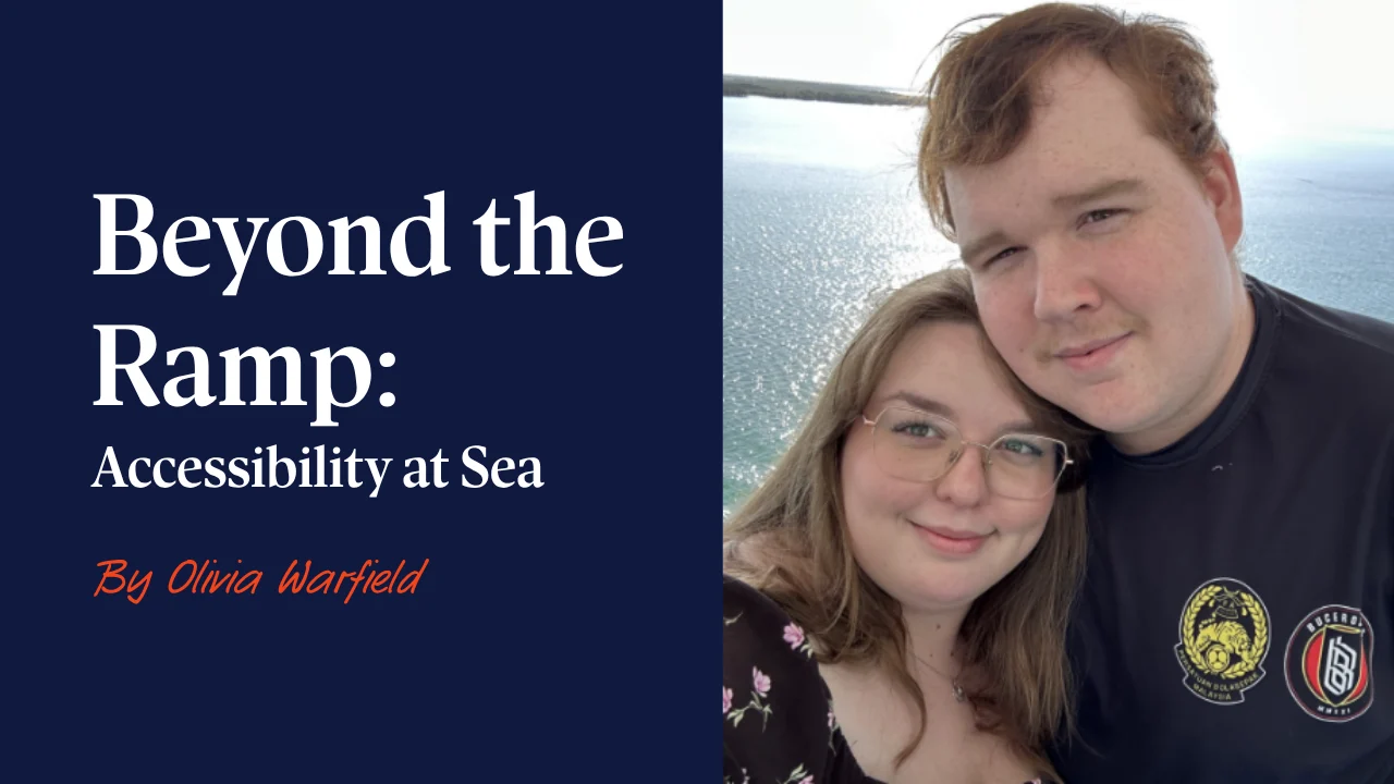 Olivia and her partner are smiling while out at sea on a Cruise ship.